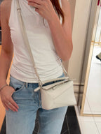 حقيبة لويفي ميني بزل من جلد العجل الناعم المحبب | حقيبة لويفي (ميني/متعددة الألوان)